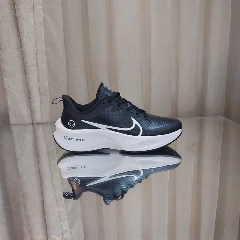 کتونی رانینگ نایک زوم ایکس nike zoom x کیفیت مستر کوالیتی ویتنام رویه چرم کتونی چرمی نایک لبخندی مشکی سفید