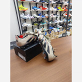 کفش فوتبال چمن آدیداس استوکدار بلینگام Predator Edge 2025 رنگ کرم مشکی یا بژ Adidas Predator رئال مادرید