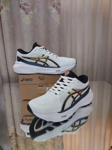 کتونی رانینگ اسیکس کایانو۳۰ کیفیت مستر کوالیتی ASICS GEL KAYANO۳۰ساخت ویتنام رنگ سفیدطلایی