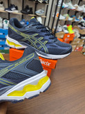 کتونی رانینگ و لایف استایل طرح اسیکس aicix رنگ سورمه ای کف سفید Aicix navy yellow