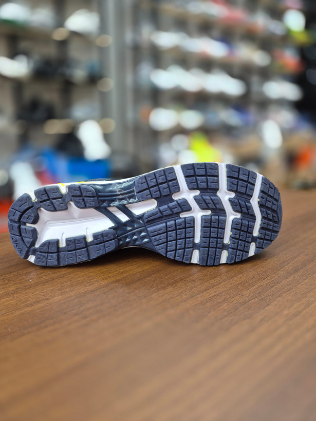کتونی رانینگ و لایف استایل طرح اسیکس aicix رنگ سورمه ای کف سفید Aicix navy yellow