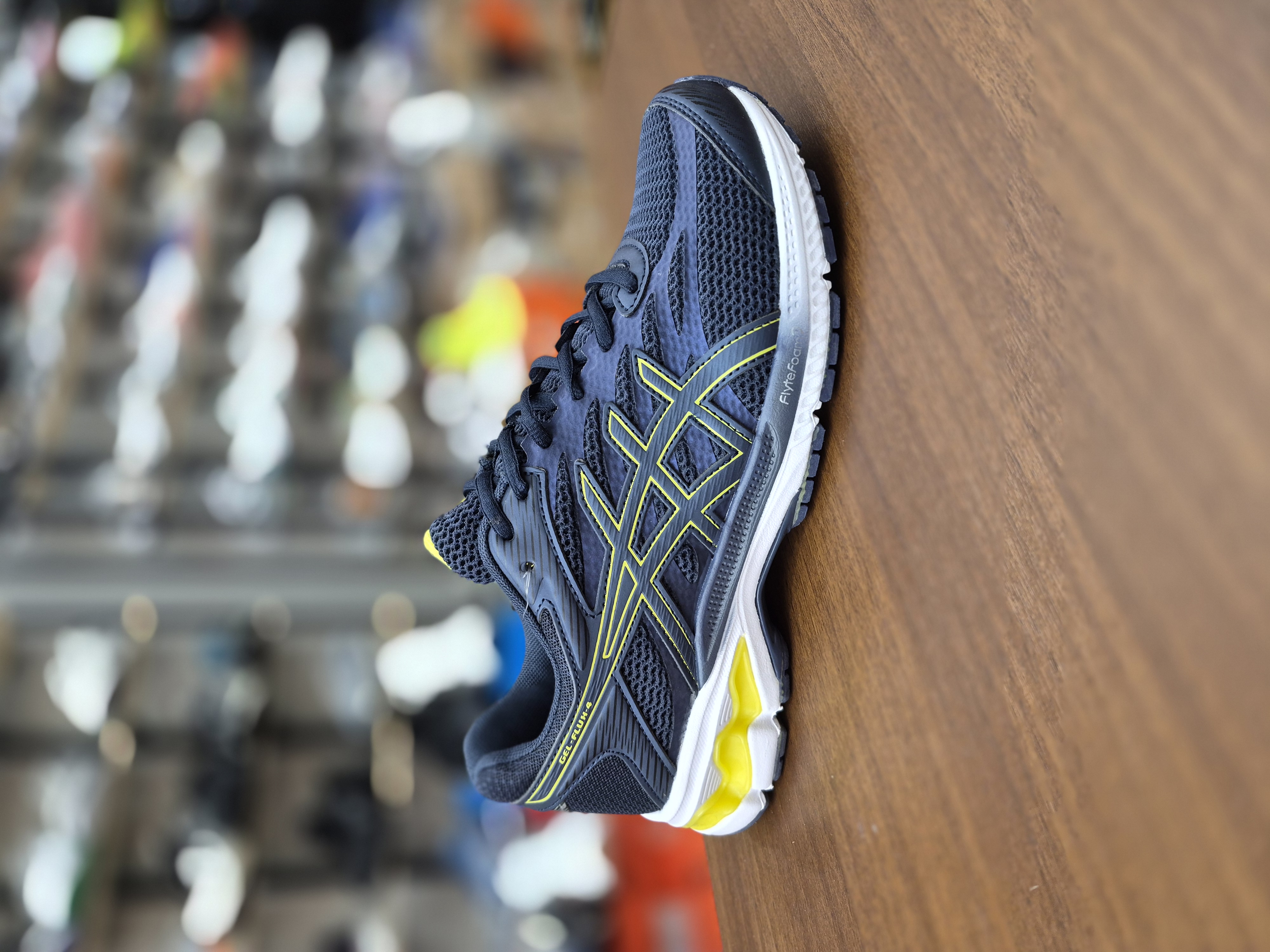 کتونی رانینگ و لایف استایل طرح اسیکس aicix رنگ سورمه ای کف سفید Aicix navy yellow